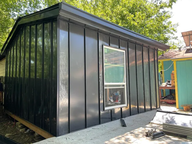 Black standing seam metal wall panels for Roof Inspection in Brookfield